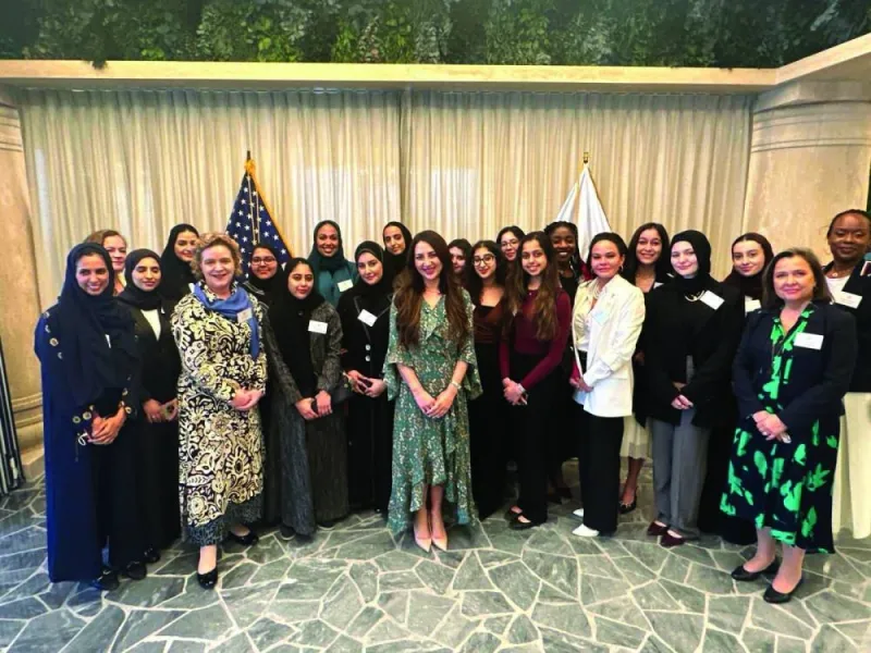Natalie Baker, Isabelle Martin, and other senior women diplomats with GU-Q students.
