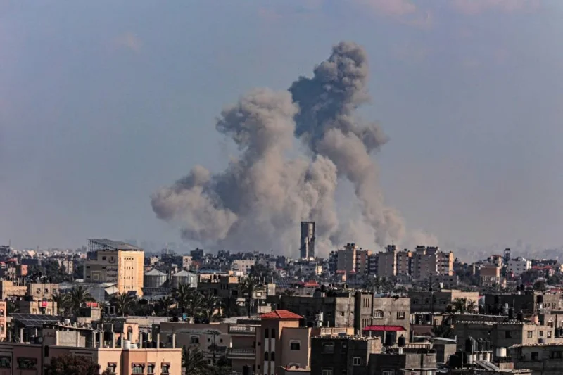 Smoke billowing over Khan Yunis in the southern Gaza Strip during Israeli bombardment on Monday. AFP