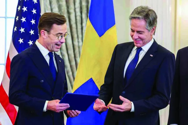 
US Secretary of State Antony Blinken accepts Sweden’s instruments of accession from Swedish Prime Minister Ulf Kristersson for its entry into Nato at the State Department in Washington last week. (Reuters) 