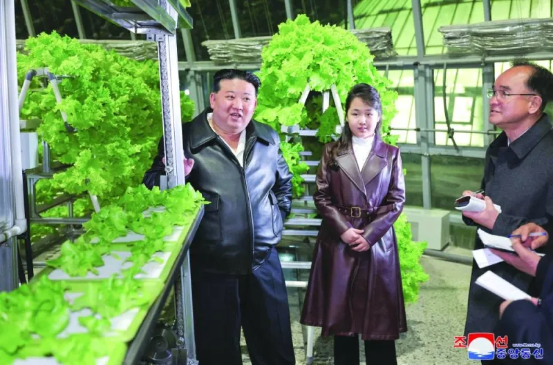 
North Korean leader Kim Jong-un and his daughter Ju Ae visiting the Gangdong Comprehensive Greenhouse in Pyongyang. 