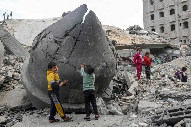 Children play in the rubble of Al-Faruq Mosque, that was destroyed during Israeli bombardment, in Rafah on the southern Gaza Strip on Sunday. AFP