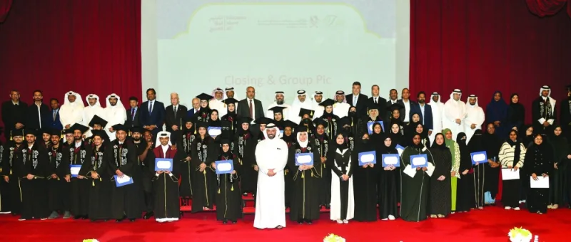 Winners of the Qatar Scholarship programme with guests and officials. PICTURE: Shaji Kayamkulam