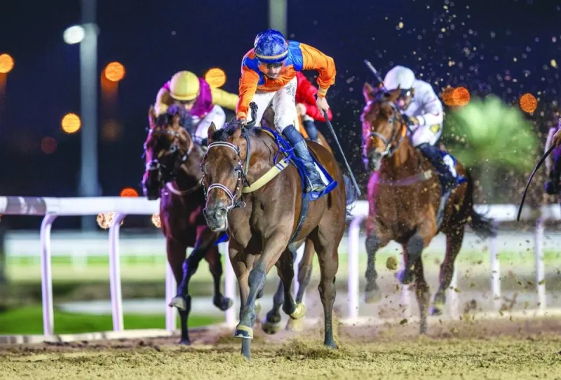 
Jockey Marco Casamento guides Dubawi Spectre to Al Jassasiya Cup victory.  