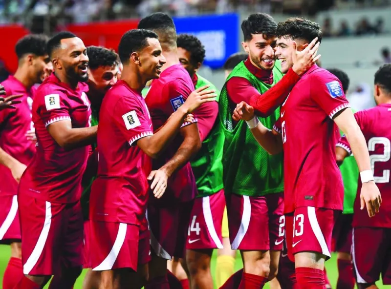 Ahmed al-Rawi (right) is congratulated by his teammates after the teenager scored his first ever senior goal on Thursday.