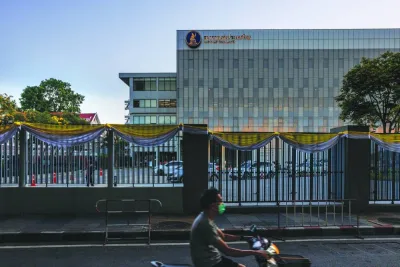 A motorist rides past the Bank of Thailand complex in Bangkok. Thailand’s central bank will weigh the need to adjust its neutral interest-rate stance at next month’s meeting, according to Assistant Governor Piti Disyatat, amid rising bets that policymakers are edging closer to a rate cut.
