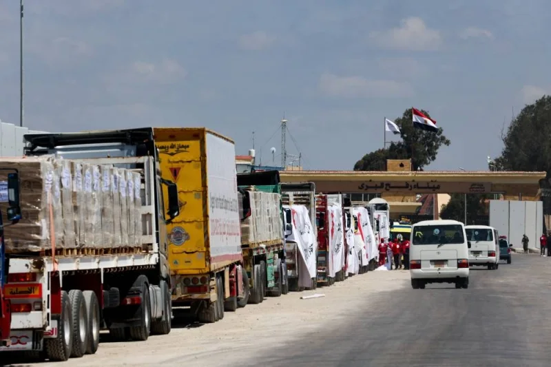 Vehicle line up, near the Rafah border crossing between Egypt and the Gaza Strip, in Rafah, Egypt, on Saturday. REUTERS