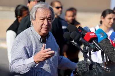 United Nations Secretary-General Antonio Guterres speaks to the media, after visiting the Rafah border crossing between Egypt and the Gaza Strip, as Egyptian Red Crescent members coordinate aid for Gaza, at Al Arish Airport, Egypt, on Saturday. REUTERS