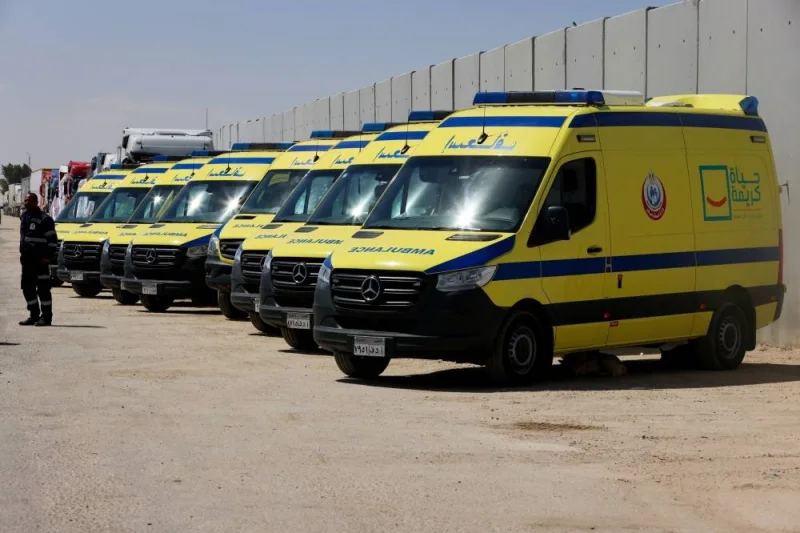 Ambulances are parked near the Rafah border crossing between Egypt and the Gaza Strip, in Rafah, Egypt, on Saturday. REUTERS