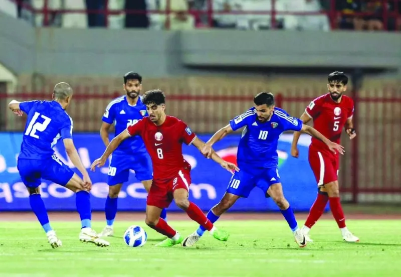 Action from the match between Qatar and Kuwait at the Sabah Al Salem Stadium on Wednesday.