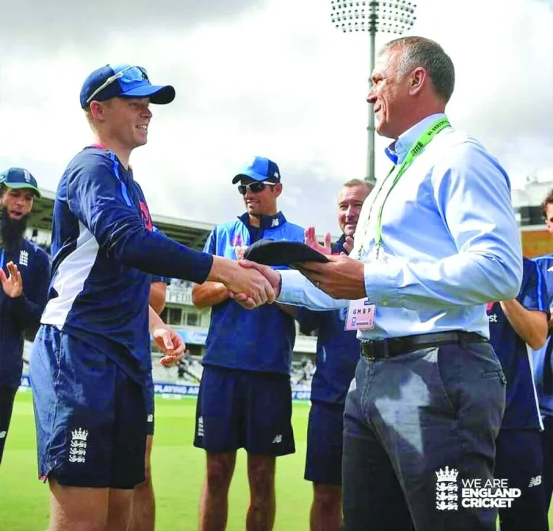 
A 20-year-old Ollie Pope receives his English Test cap from former England captain and Surrey great Alec Stewart in this August 2018 photo. 