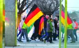 
Protesters carry national flags of Germany and the ultra far-right party Freie Sachsen (Free Saxony) during a demonstration in Chemnitz.  (Reuters) 