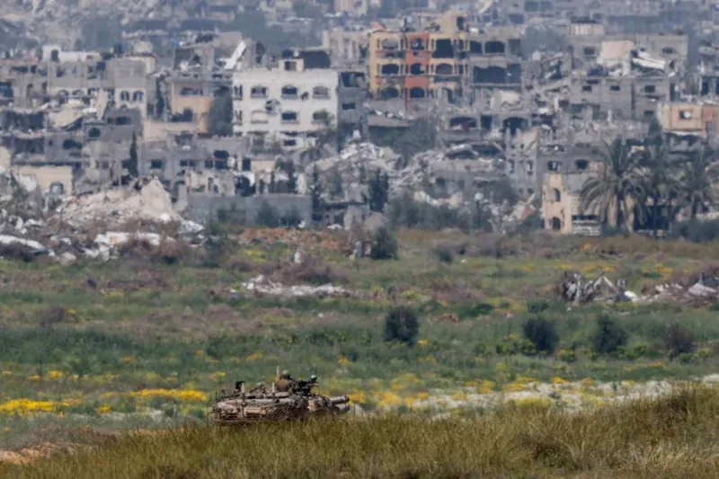 Israeli tank maneuvers along Israel-Gaza border in southern Israel, Saturday. REUTERS