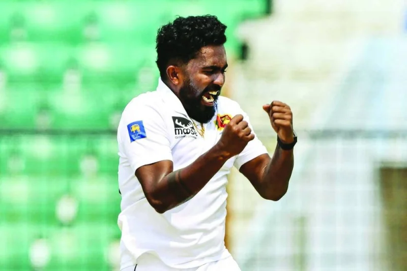 Sri Lanka’s Asitha Fernando celebrates after the dismissal of the Bangladesh’s Shakib Al Hasan during the third day of the second Test in Chittagong on Monday. (AFP)