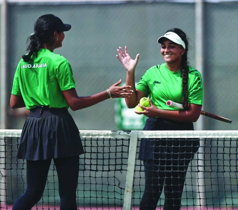 
Saudi tennis players gesture during a tournament in Riyadh, Saudi Arabia. The WTA and Saudi Sports Ministry announced that the season-ending WTA Finals will be held in Riyadh from 2024-2026. (Reuters) 