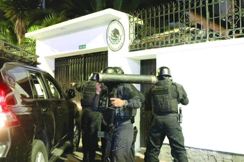 
Ecuadorian police special forces attempt to enter the Mexican embassy in Quito to arrest Ecuador’s former vice-president Jorge Glas. (AFP) 