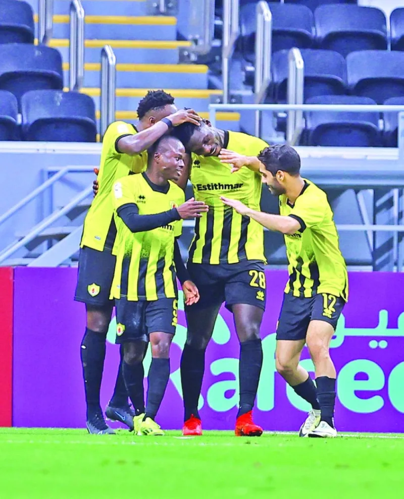 Qatar SC players celebrate after their win over Al Shamal in the Expo Stars League at the Al Bayt Stadium on Saturday.