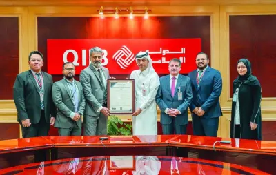 QIIB Deputy CEO Jamal Abdullah al-Jamal received the PCI-DSS - 4.0 certification during a ceremony held at the bank’s headquarters at Grand Hamad Street, which was attended by Mohamed Jamil Ahmad Hamad, head (Risks Sector) at QIIB besides senior bank executives and representatives of SISA International.