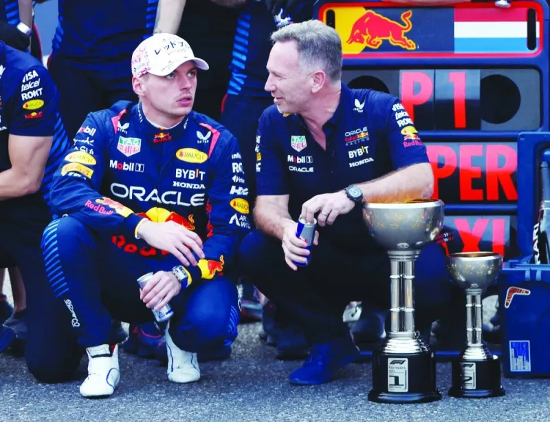 
Red Bull’s Max Verstappen celebrates after winning the Japanese Grand Prix with Red Bull team principal Christian Horner in Suzuka, Japan, on Sunday. (Reuters) 