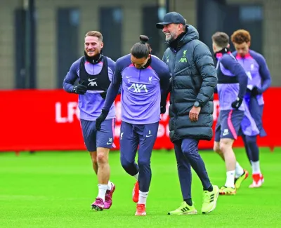 Liverpool manager Juergen Klopp (second right) with Darwin Nunez (centre) and Alexis Mac Allister during a training session in Liverpool Xabi Alonso. (Reuters)