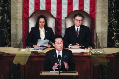 Japanese Prime Minister Fumio Kishida addresses a joint meeting of Congress, as US Vice-President Kamala Harris and House Speaker Mike Johnson listen, at the US Capitol in Washington, US, on Thursday.