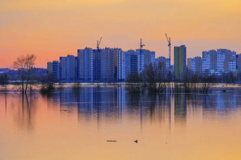 
A general view shows a flooded area during sunset in Orenburg, Russia. 