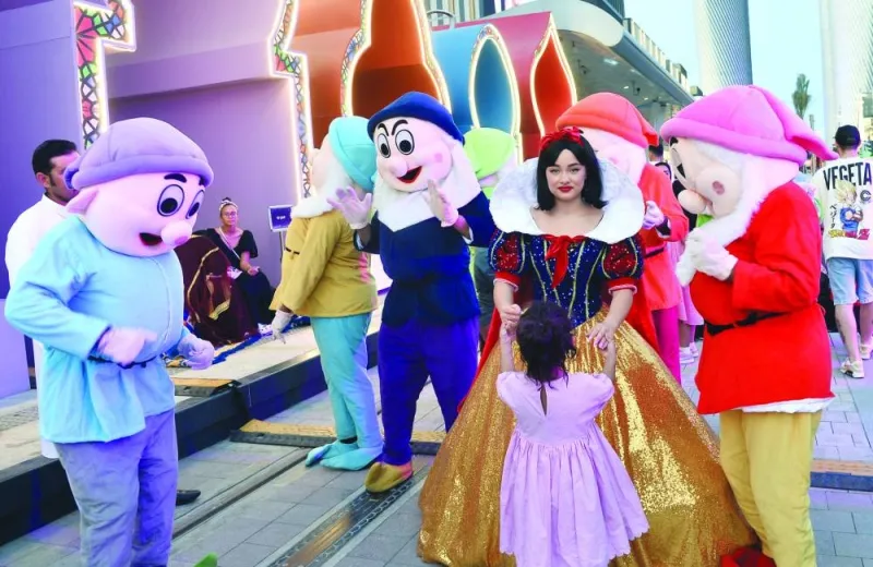 Performers dressed as &#039;Snow White and the Seven Dwarfs&#039; entertain children at Lusail Boulevard Friday, as part of the Eid al-Fitr celebrations. PICTURE: Shaji Kayamkulam