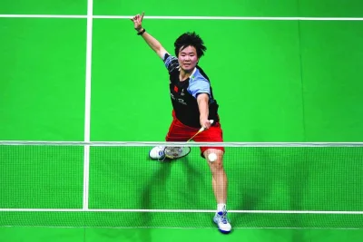 China’s He Bingjiao hits a return to South Korea’s An Se-young during the quarter-final match at Badminton Asia Championships in Ningbo, China, on Friday. (AFP)
