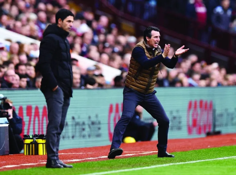 
Unai Emery (right) was sacked by Arsenal before being replaced Mikel Arteta. (Reuters) 