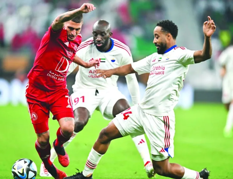
Al Arabi’s Marco Verratti (left) vies for the ball with Sharjah’s players. 