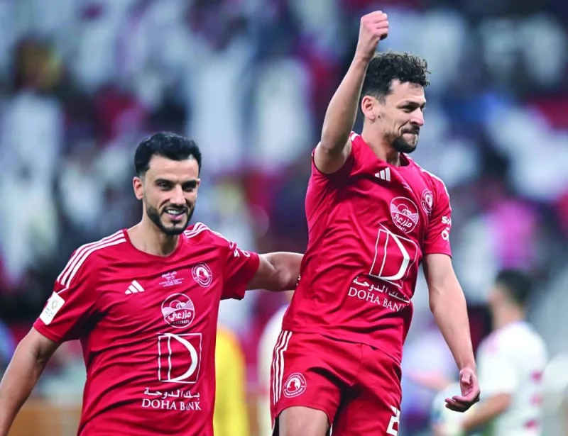 Al Arabi’s Yousef Msakni (right) celebrates with teammate Omar al-Somah after scoring against Sharjah FC at the Al Thumama Stadium on Friday.