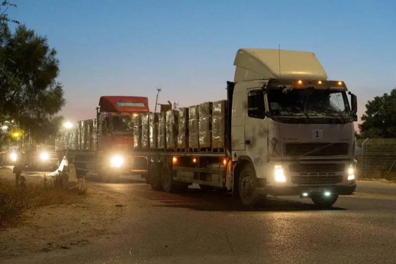 Trucks carrying humanitarian aid preparing to enter the Gaza. AFP