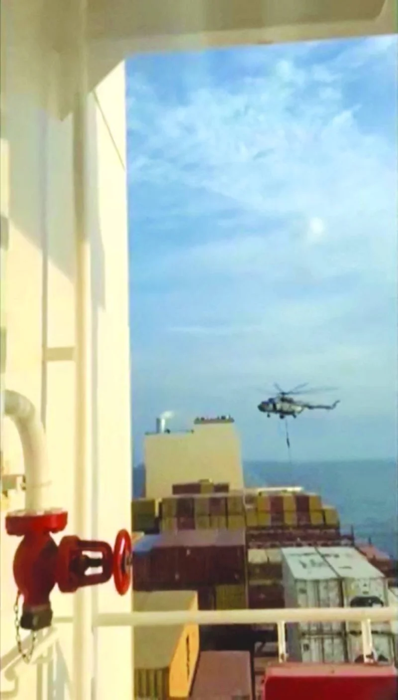 This image grab taken from a UGC video posted on social media yesterday shows Iran’s Revolutionary Guards rappelling down onto a container ship named, MSC Aries, near the Strait of Hormuz.