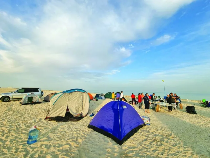 Holiday-goers camp at Al Kharaij beach this Eid al-Fitr break. PICTURE: Joey Aguilar