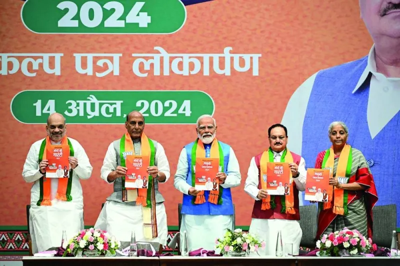 
(Left to right) India’s Home Minister Amit Shah, Defence Minister Rajnath Singh, Prime Minister Narendra Modi, Bharatiya Janata Party (BJP) president J P Nadda and Finance Minister Nirmala Sitharaman release the party manifesto ahead of country’s upcoming general elections, at the party headquarters in New Delhi yesterday. 