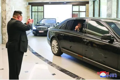 
North Korean leader Kim Jong-un (left) greets China’s top lawmaker Zhao Leji in Pyongyang. 