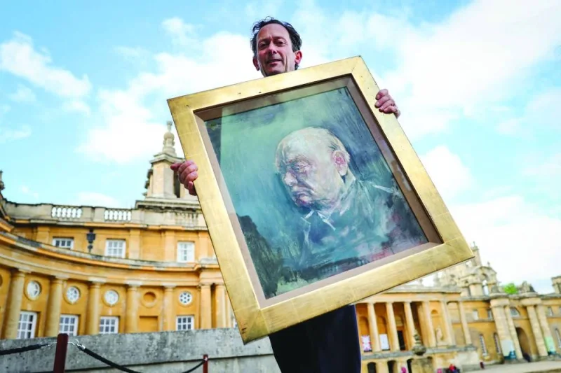 Andre Zlattinger, Sotheby’s head of Modern British and Irish Art poses with a portrait, a surviving study of Winston Churchill, at Blenheim Palace, north of Oxford, home to the Duke of Marlborough and Churchill’s family home, yesterday.
