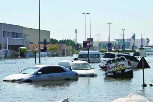Cars are stranded on a flooded street in Dubai following heavy rains, on Friday.
