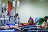 
File photo shows a girl sitting among patients in the kidney dialysis area at the Al-Aqsa Martyrs Hospital in Deir el-Balah, central Gaza Strip, amid the ongoing conflict between Israel and the Palestinian Hamas group. 