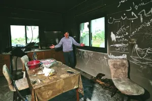 
A Palestinian man gestures as he stands inside his kitchen in the aftermath of an attack by Israeli settlers in the occupied West Bank village of Al-Mughayyir near Ramallah recently. 