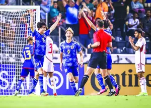 Japan’s Sota Kawasaki (left) celebrates after scoring against the United Arab Emirates during the AFC U-23 Asian Cup Group B match at the Jassim Bin Hamad Stadium on Friday.