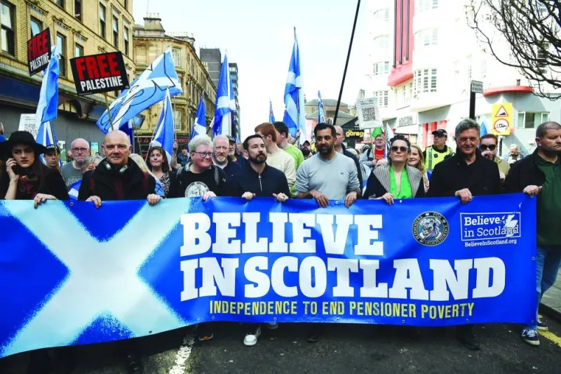 
Scotland’s First Minister Humza Yousaf (centre-right) and Scottish actor Martin Compston (centre-left) join a march in support of Scottish independence in Glasgow, yesterday. 