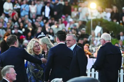 
Australian Prime Minister Anthony Albanese and Waverley council mayor Paula Mussels attend the community candlelight vigil, recognising the victims of a fatal stabbing attack at Bondi Junction Westfield shopping centre, in Sydney, Australia, yesterday. 