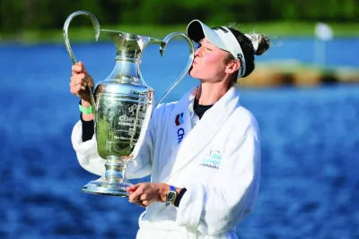 
Nelly Korda of the United States celebrates with the trophy after winning The Chevron Championship in The Woodlands, Texas. (AFP) 
