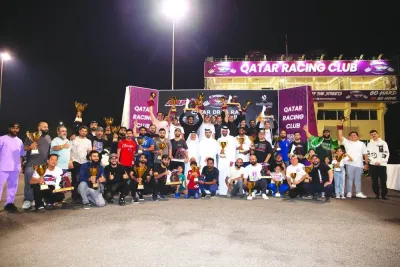 
Winners of the fourth round and the season champions pose with QRC Director Sheikh Jabor bin Khalid al-Thani. 