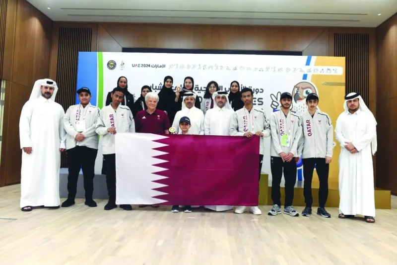 
Qatar Chess Federation President Mohamed al-Mudhaka with chess contingent at the GCC Youth Games in Abu Dhabi. 