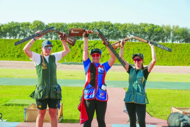 
Slovakia’s Zuzana Stefecekova celebrates after winning the women’s trap event during Final Olympic Qualification Shotgun Championship at the Lusail Shooting Complex yesterday. Australia’s Laetisha Scanlan (left) finished second while her compatriot Penny Smith was third. 
