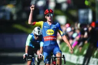 Team Lidl-Trek’s Belgian rider Thibau Nys celebrates as he crosses the finish line ahead of second-placed team Decathlon AG2R La Mondiale’s Italian Andrea Vendrame, during the second stage of the Tour of Romandy on Thursday. (AFP)