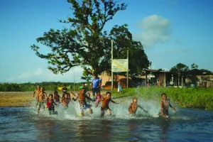 
Children of Karipuna people play at the Uaha village on the Jumina Indigenous land, near the mouth of the Amazon in Oiapoque, State of Amapa, Brazil. (Reuters) 
