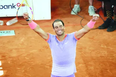 Spain’s Rafael Nadal celebrates victory against Australia’s Alex De Minaur at the end of the second round of the Madrid Open in Madrid on Saturday. (AFP)