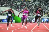 
South Africa’s Akani Simbine (left), finishes ahead of USA’s Christian Coleman (centre) and USA’s Fred Kerley in the men’s 100m in Suzhou. (AFP) 